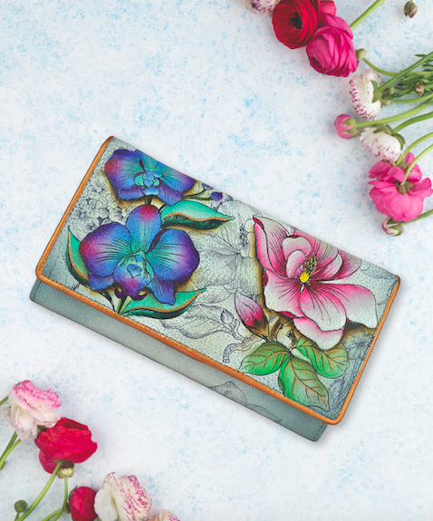 anuschkaleather's tweet photo. Every woman deserves a reliable and beautiful purse. Look no further than the Accordion Flap Wallet in the Floral Fantasy artwork. Shop now at https://t.co/zDzyYIY7J8 https://t.co/WB9zR7VBzY