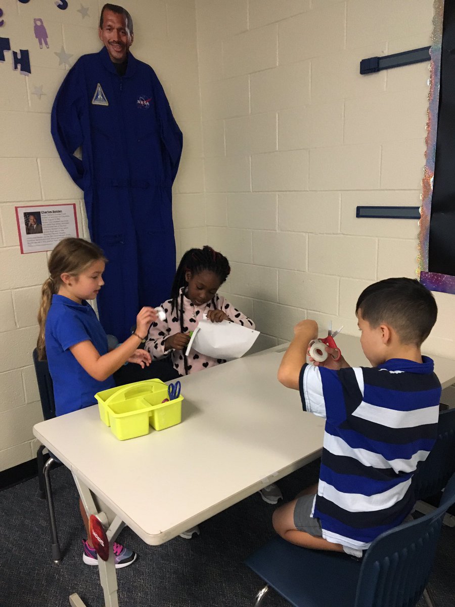 FLNASAlab's tweet photo. Student Space Explorers at Forest Lake are working as a team to create the longest tether possible for a stranded astronaut using only a single sheet of paper! https://t.co/ZrQ0eFzjzY