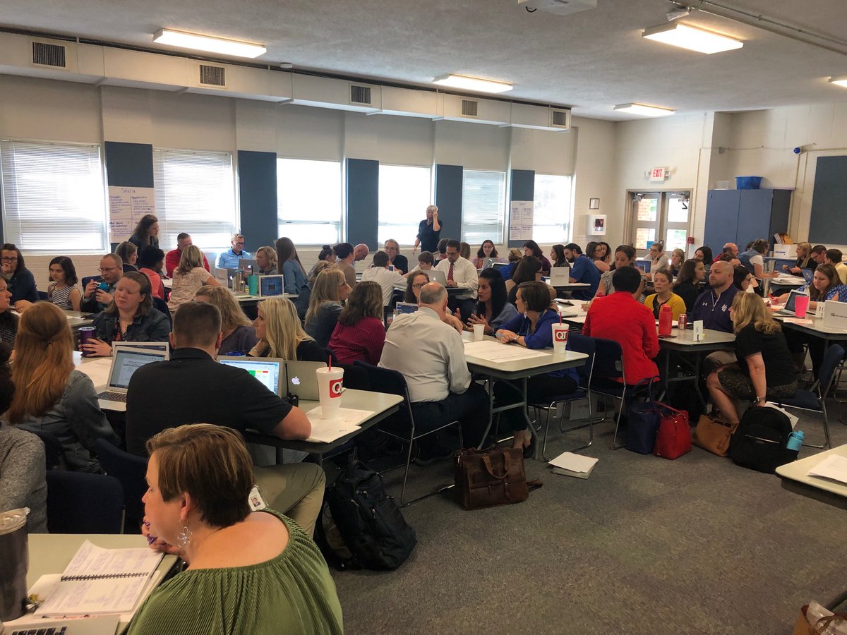 NKC Building Leadership Teams collaborating on ways they collect evidence of PLT work in their buildings.