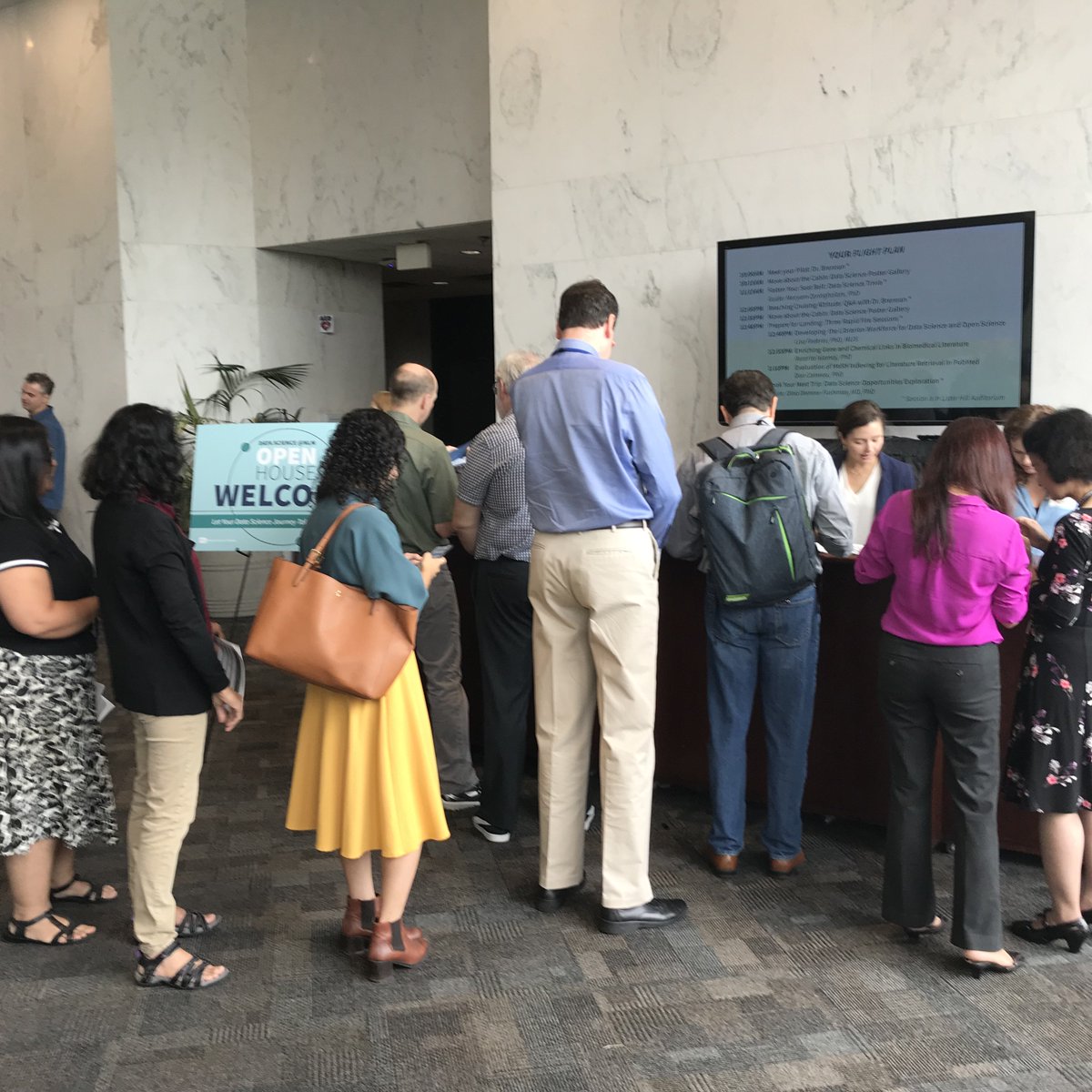 NLM_NIH's tweet photo. NLM-ers have their passports and are on a journey! A data-driven journey and are showing off their hard work to fellow staff members #datareadyNLM https://t.co/S7qnfSMGY5