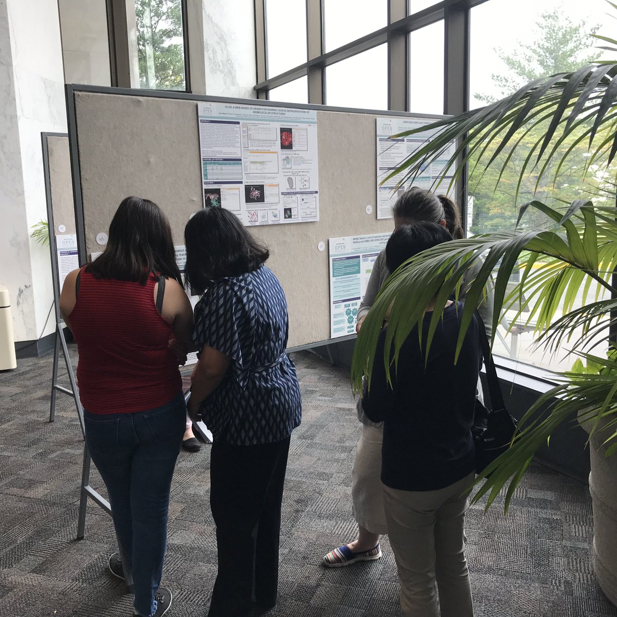 NLM_NIH's tweet photo. NLM-ers have their passports and are on a journey! A data-driven journey and are showing off their hard work to fellow staff members #datareadyNLM https://t.co/S7qnfSMGY5