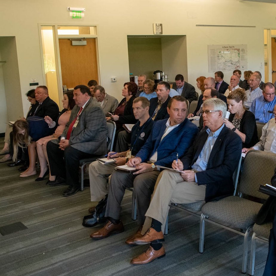 MoDNR's tweet photo. .@GovParsonMO speaking to a full house at the initial Flood Recovery Advisory Working Group meeting, “We are doing something we’ve never done before. If we all work together, we can find solutions. We can do better!” #MoFlood #MoRecovery  https://t.co/6c9e2QJTQf https://t.co/urrTUMxf6f