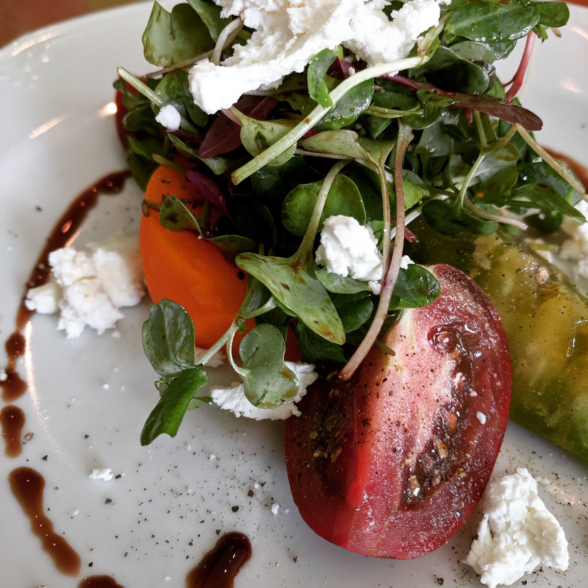 JLBistro's tweet photo. Heirloom Tomato Salad with organic greens, goat cheese and balsamic vinaigrette. If we can't have the sun shining, at least we can taste it! https://t.co/UX4fpcDnKL