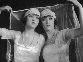After WW1, the Sisters moved to France where they toured the theaters and dance halls of Europe. They were as famous for their wealthy lovers as for their shows. They were linked to Carol II of Romania, Christian X of Denmark and Alfonso XIII of Spain, among many others
