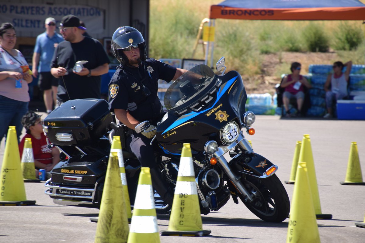 dcsheriff's tweet photo. Sunday's #RumbleintheRockies was a huge success. Two of DCSOs finest took 3rd place spots in their division. Deputies Arnold and Swartz showed their mad motor skills. Great job! Thanks to all those that rode for such a great cause, DC Fallen Officer Fund. @DCSOTraffic https://t.co/8Eh2tlKZFC