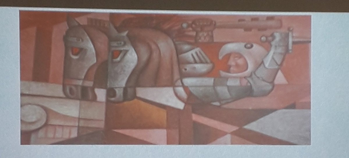 KesiMahendran's tweet photo. The painting by #GonzálesCamarena is called "Prescence of Latin America" the colonial invader occupies only a tiny portion. Red face symbolizes Latin America. Prof. Livia Simao explores shared myths & the creation of phantasms. #decolonization #decolonizingcurriculum #ISTP2019 https://t.co/pynbtkrLhJ