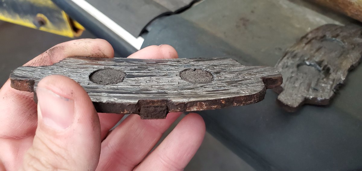 carzrus's tweet photo. We had a 2005 Nissan Quest come in with a brake grind in the rear. Upon inspection we found there was no pad left, just the plate it attaches to. The lesson here is not to wait if you hear a noise in your brakes, this could have been a major repair if not caught in time! https://t.co/wAW2MUFEsT
