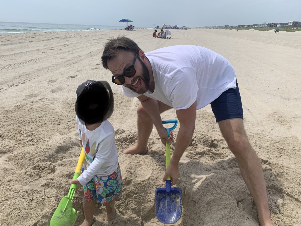 My nephew and I, digging a big hole at the beach.