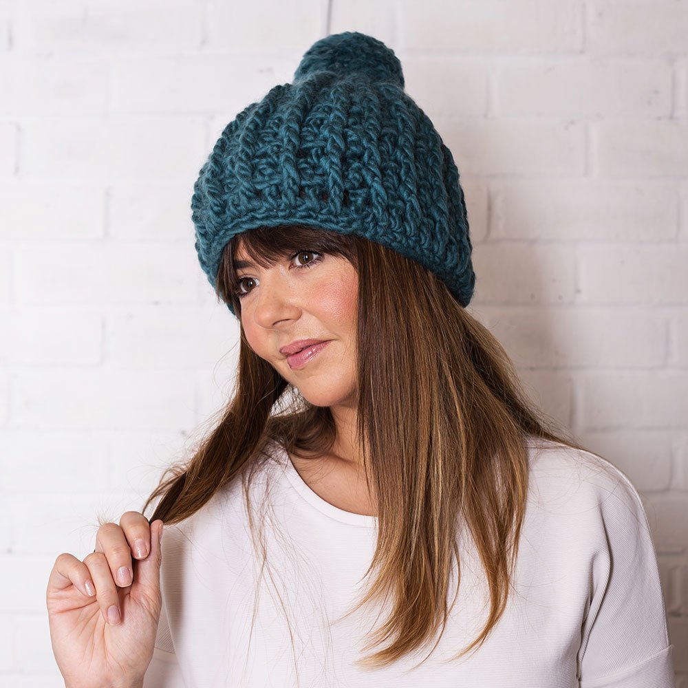 NEW! Get ahead of the Autumn chills with our new Melanie Pompom Crochet Hat Kit. loom.ly/on2pEXg #chunkyhat #pompom #bobblehat #woolcouture