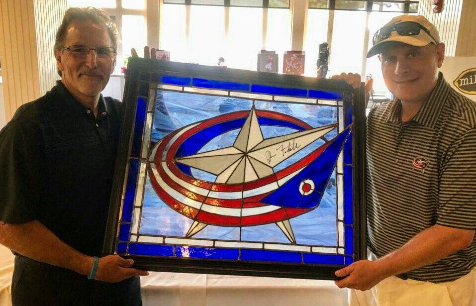 AnthonyRothman's tweet photo. Torts signed the amazing stained #CBJ glass created by Jack Campbell. Auctioned for "Homeless to Home Animal Rescue &amp; Cat Sanctuary" I see the symbolic light shining through on the impact we all can make! 
#FindAWay #KeepPushing https://t.co/v5FK8ribmT
