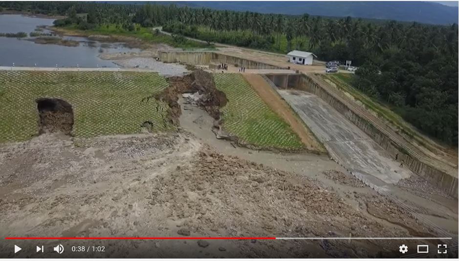 SafeDams's tweet photo. Thailand: YouTube Video of Dam following failure by Internal Erosion - details are still emerging regarding the failure of the Ban Morasuap Dam believed to have occurred August 11, 2019 https://t.co/3Y1gqgkzUF https://t.co/MElge7nT0D