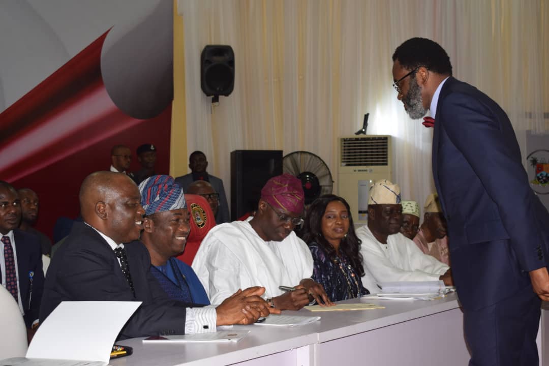 Governor Sanwo-Olu presenting  Certificate of Appointment to Mr. Moyo Onigbanjo, SAN as the State Attorney-General &amp; Commissioner for Justice at a Swearing-in-Ceremony of State Cabinet Members today.