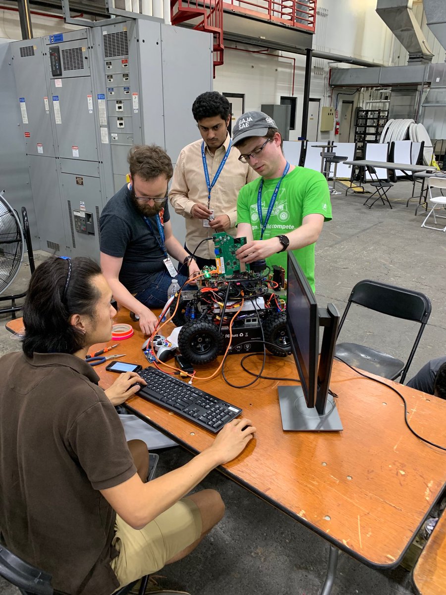 crheckman's tweet photo. How many ⁦@CUEngineering⁩ robotics PhD students does it take to screw in an antenna at ⁦the @DARPA⁩ #SubTChallenge? ⁦@BoulderMarble⁩ is ready to give EX another shot, this time potentially with some new hardware! https://t.co/9zU44iXCOl