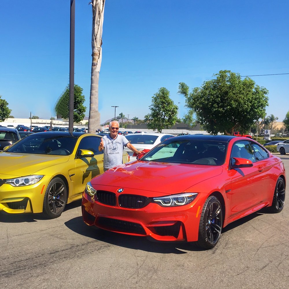 BMWofOntario's tweet photo. A very special BMW of Ontario client bidding farewell to his Austin Yellow BMW M4 and upgrading to a 2019 BMW M4 in Shakir Orange! #CompetitionPackage #MTown #ShakirOrange https://t.co/qeF8oREgpx