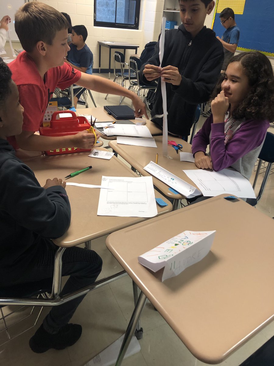 aschulz116's tweet photo. Did some team building to get the year off on a good note! #papertowerchallenge #mathclass https://t.co/0xFeOgByqU