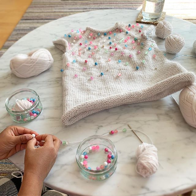 Getting some help from little hands today. She’s stringing the beads for the sleeves. We’ve divided up the remaining yarn and beads so I can knit the sleeves two-at-a-time (which I’ve never done before 😬). I think I’m going to make the sleeves 3/4 le… ift.tt/2NjLZxu