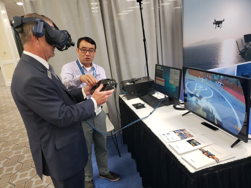 AUVSI's tweet photo. AUVSI President and CEO, @bwynne, is demoing @FlightSafetyInt's #training #solution. How cool! #USDPS19 #SolutionsShowcase https://t.co/hMlsp8wLJ3