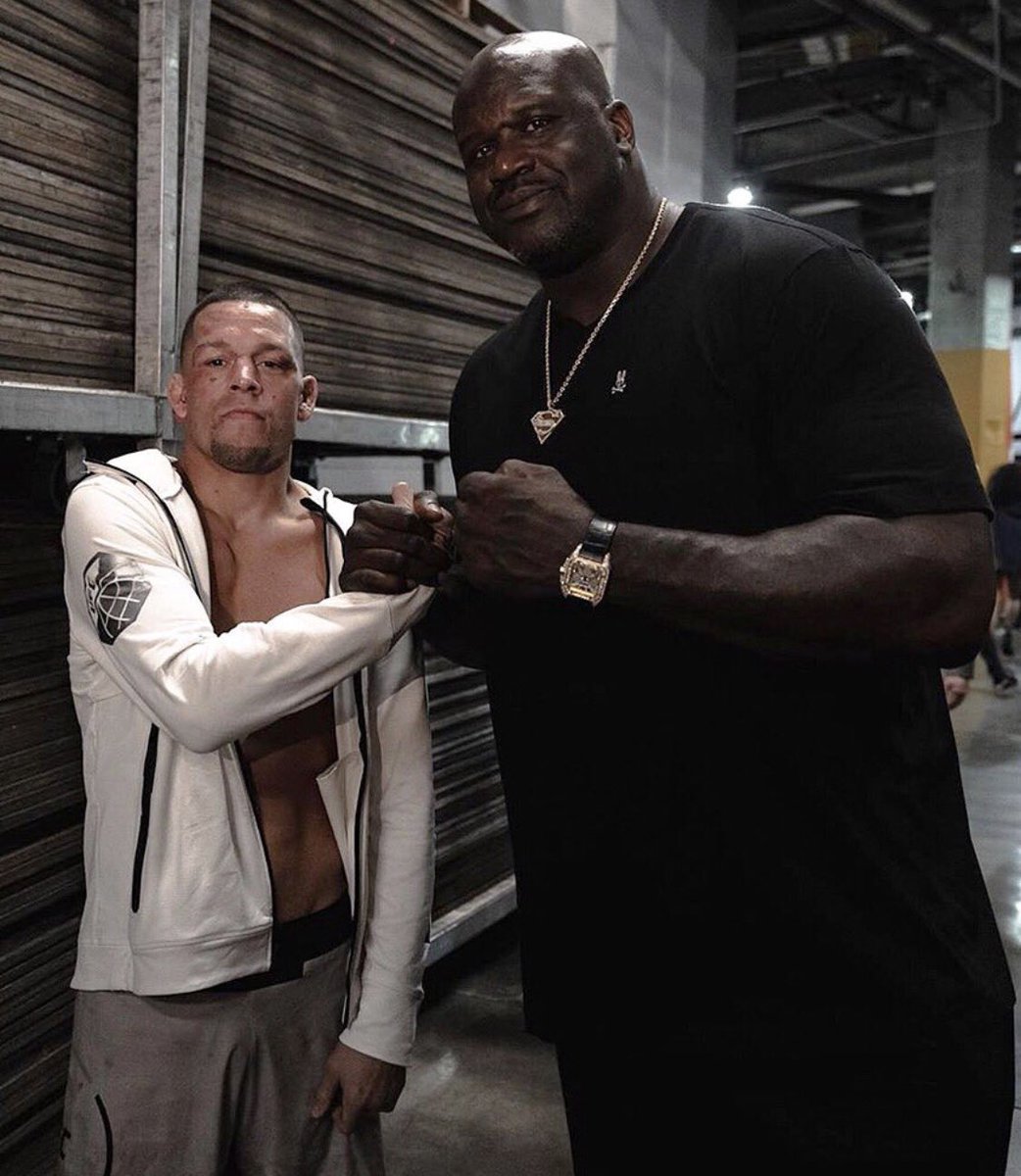 That fella <a href="/SHAQ/">SHAQ</a> seems to be a mite taller than <a href="/NateDiaz209/">Nathan Diaz</a>...at least at first glance. 
Hey Shaq...next time you are in #Knoxville, come by <a href="/KnoxMma/">Knox-mma Academy</a> so I can get a pic like that!! #Phoenix #Shaq