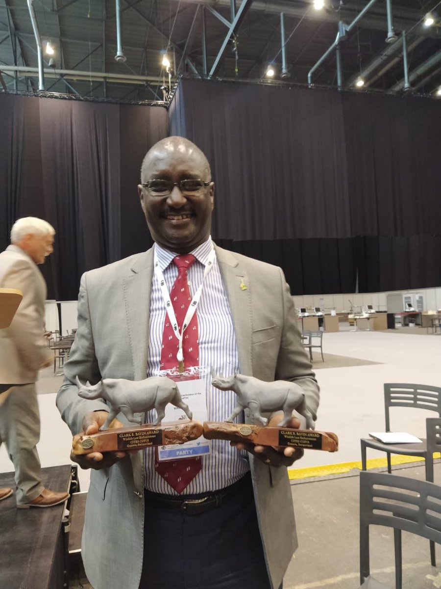 KWSKenya's tweet photo. .@kwskenya DG, Brig. (Rtd) John Waweru accepting awards on behalf of The Late Ag. DG Julius Kimani &amp; Julius Mwandai, (Rtd) SAD,Security who were selected to receive the Clark Bavin Wildlife Law Enforcement Awards on the sidelines of the ongoing CITES #CoP18 in Geneva, Switzerland https://t.co/b39i8rwjG8