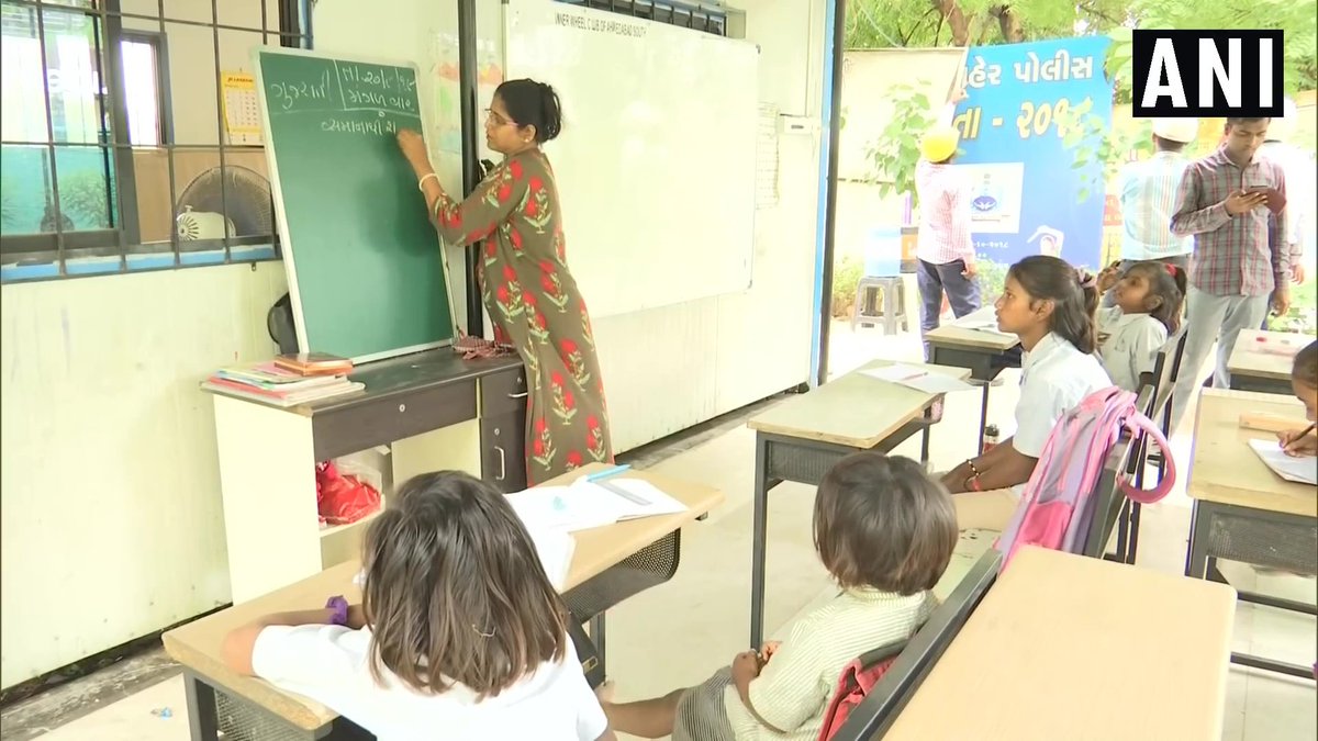ANI's tweet photo. Gujarat: Ahmedabad City Traffic Police imparts free education to children residing on footpaths under their project called 'Police Pathshala'. Around 150-200 children are getting education in three centers across the city. https://t.co/YydKzeKMrJ