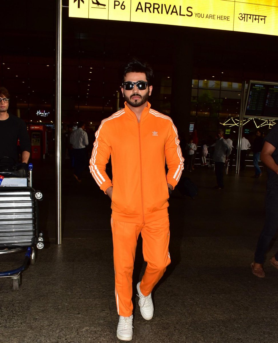 orange colour tracksuit