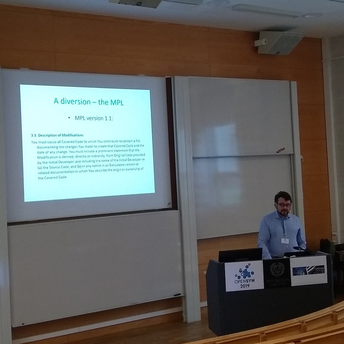 dirkriehle's tweet image. Andrew Katz talking about the design requirements for CERNs open hardware licens---only world Peace was missing #opensym 2019