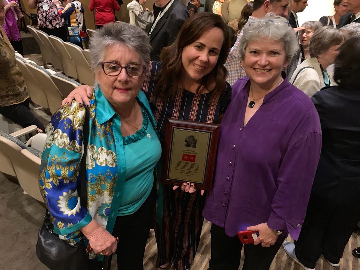 Erica Kram accepting the award for Netflix