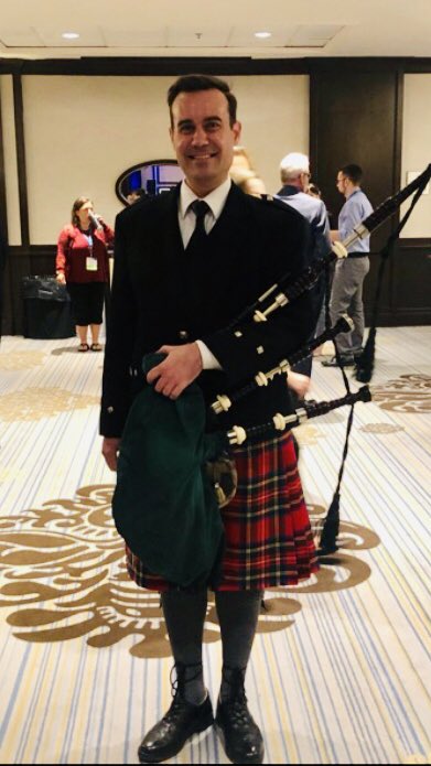 IpacManitoba's tweet photo. Former chair @IpacManitoba Rob McLeary prepares to pipe in dignitaries at the last plenary session of #IPAC2019IAPC.  Rob is Chief of Staff, Public Service Renewal at Privy Council Office.  #IPAC #IPAC2019 #IPAC2020IAPC https://t.co/74oARsw4By