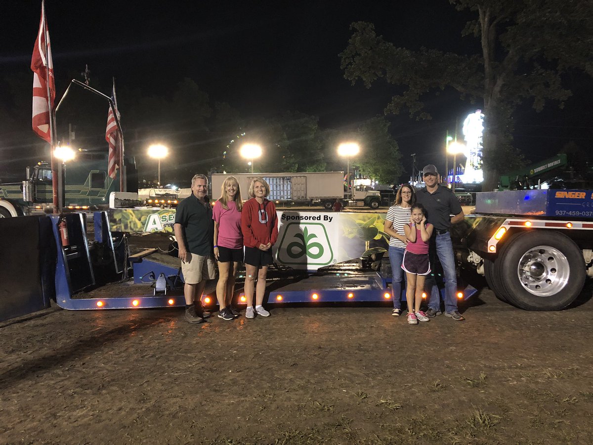 hartman_kelli's tweet photo. @PioneerSeeds was well represented last night at the @DarkeCountyFair Truck &amp; Tractor Pull! Be sure to stop out at the Pioneer booth this week &amp; chat with one our our reps and see what’s new at @corteva and Pioneer! You can’t miss it at night either- the field signs light up! https://t.co/qVMTgmTmoO