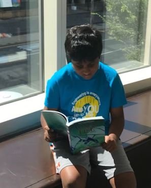 tdchilders's tweet photo. Rohan Rajesh, a fifth grader, enjoying the sights of Boston and the fantasies of 'Wings of Fire' at Barnes &amp; Nobles in downtown Boston. @AGHoulihan @jttopp #PRC2019 https://t.co/SaSB3ImW4a