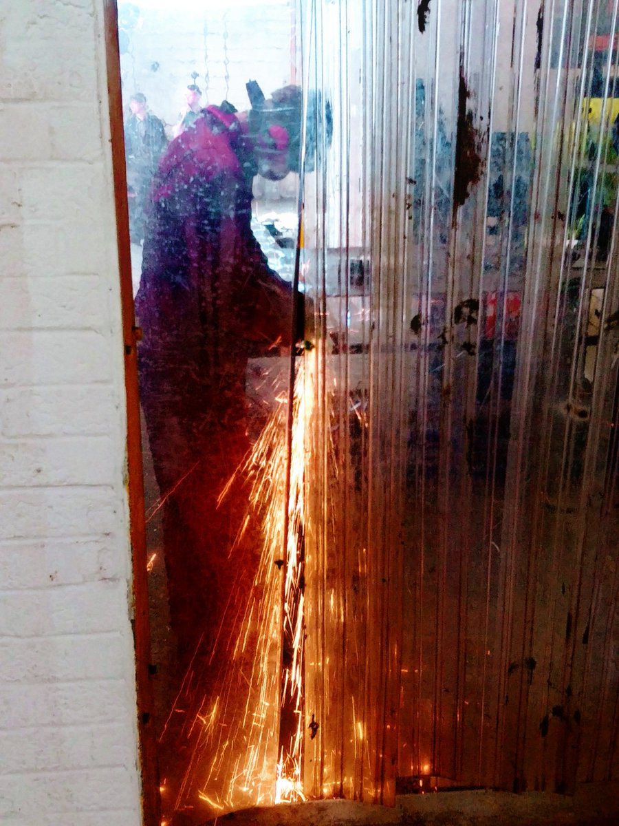 NeilssteelsLtd's tweet photo. Looks like a shot from a horror movie or something... In reality I was just waiting for him to finish grinding before walking through 😅

#welding #welders #ukwelding #ukwelders #weldporn #britishmanufacturing #weldersofinstagram https://t.co/afWb4OuwxI