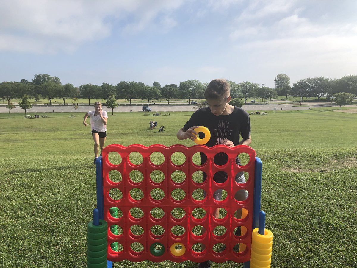 thegeeklyreader's tweet photo. Started this muggy day with @carlson_xc testing out the libraries new giant connect four game. Be on the look out for our new game corner in the CHS library this year! #GSDSummer #MarauderPride https://t.co/nvxZHBIbMX