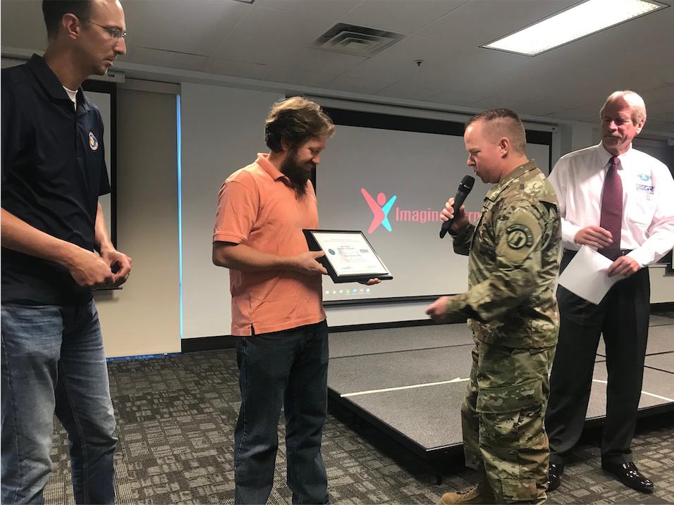 We're proud to support our <a href="/UTNationalGuard/">Utah National Guard</a> employees and to have one of our employees receive the <a href="/ESGR/">ESGR</a> Patriot Award from the Department of Defense. Congratulations to Ben Tanner. And thank you to Aaron Reynolds for his service.  bit.ly/33JHgL8 <a href="/23rdArmyBand/">23rd Army Band</a>  #edtech