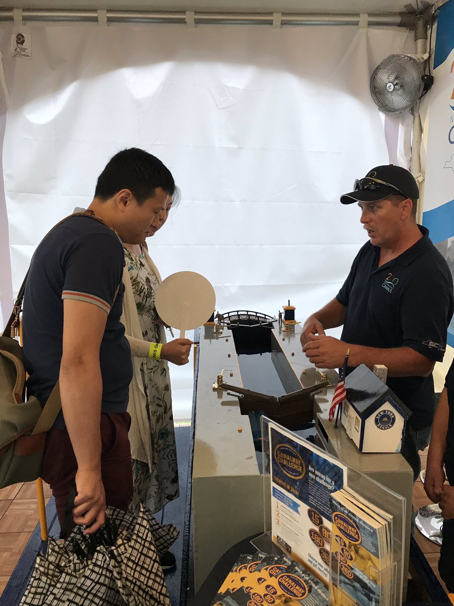 NYSCanalCorp's tweet photo. The rain’s not stopping us! Come and learn about the New York State Canal System in our booth at The Great @NYSFair and check out our model lock to see how a lock works. https://t.co/J73WD7kg3n
