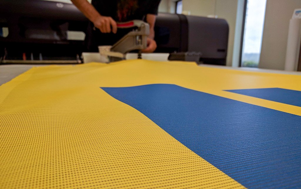 Image360 Kansas City On Twitter Putting Grommets On Some Mesh