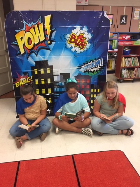 Mrs. Abbott's 5th grade class became reading superheroes!  #theyevenhavecapes #readingisoursuperpower #OneTeamOneMissionOneRockHill