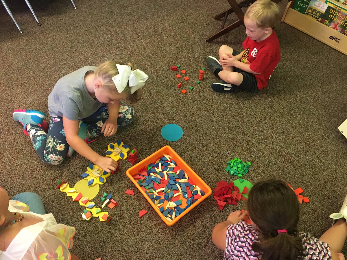 JamiKupper's tweet photo. Learning how to work together and build with pattern blocks. So much imagination! #wlcardpride https://t.co/0wiHOwnTeN