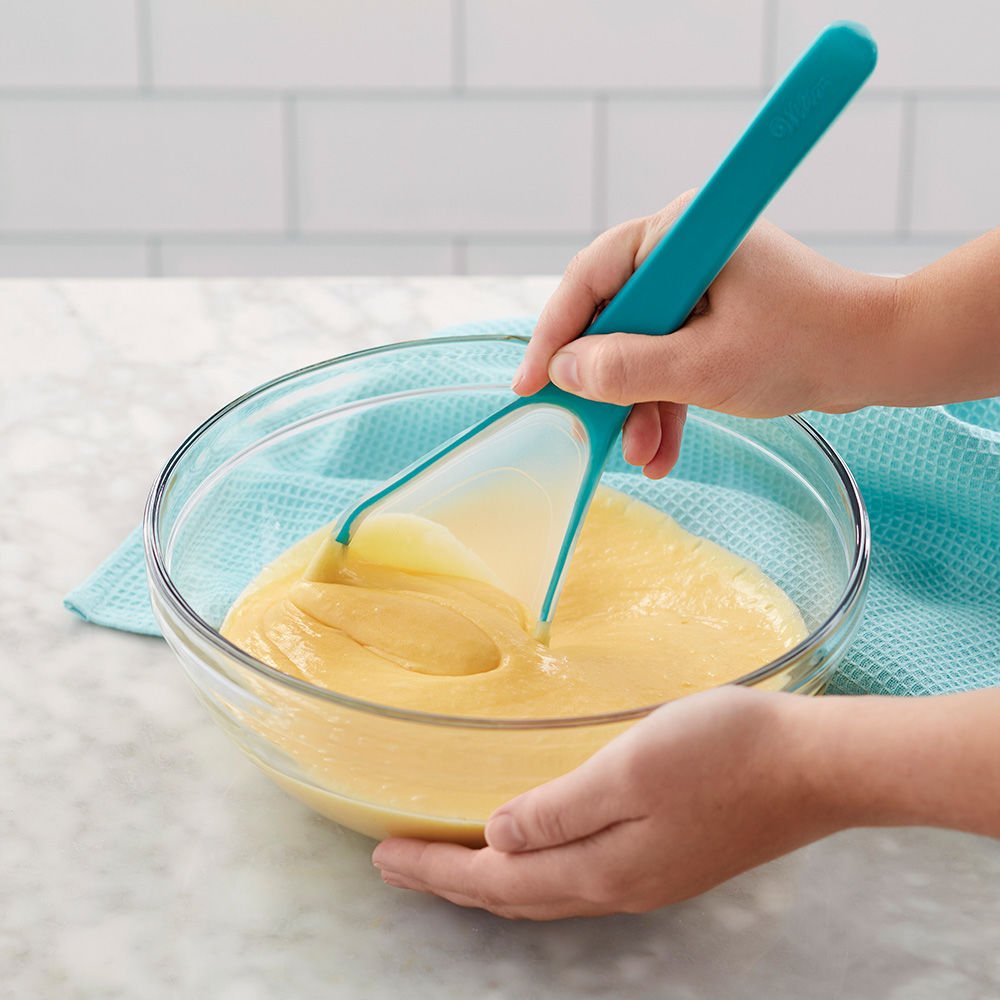 WiltonCakes's tweet photo. Easily measure, pour and mix with the #VersaTools Measure and Mix Spoon. This tool is great for measuring and pouring the perfect amount of batter, dressing or other liquid ingredients. https://t.co/OLQYAFykqS #wiltoncakes https://t.co/iR8emExU6v