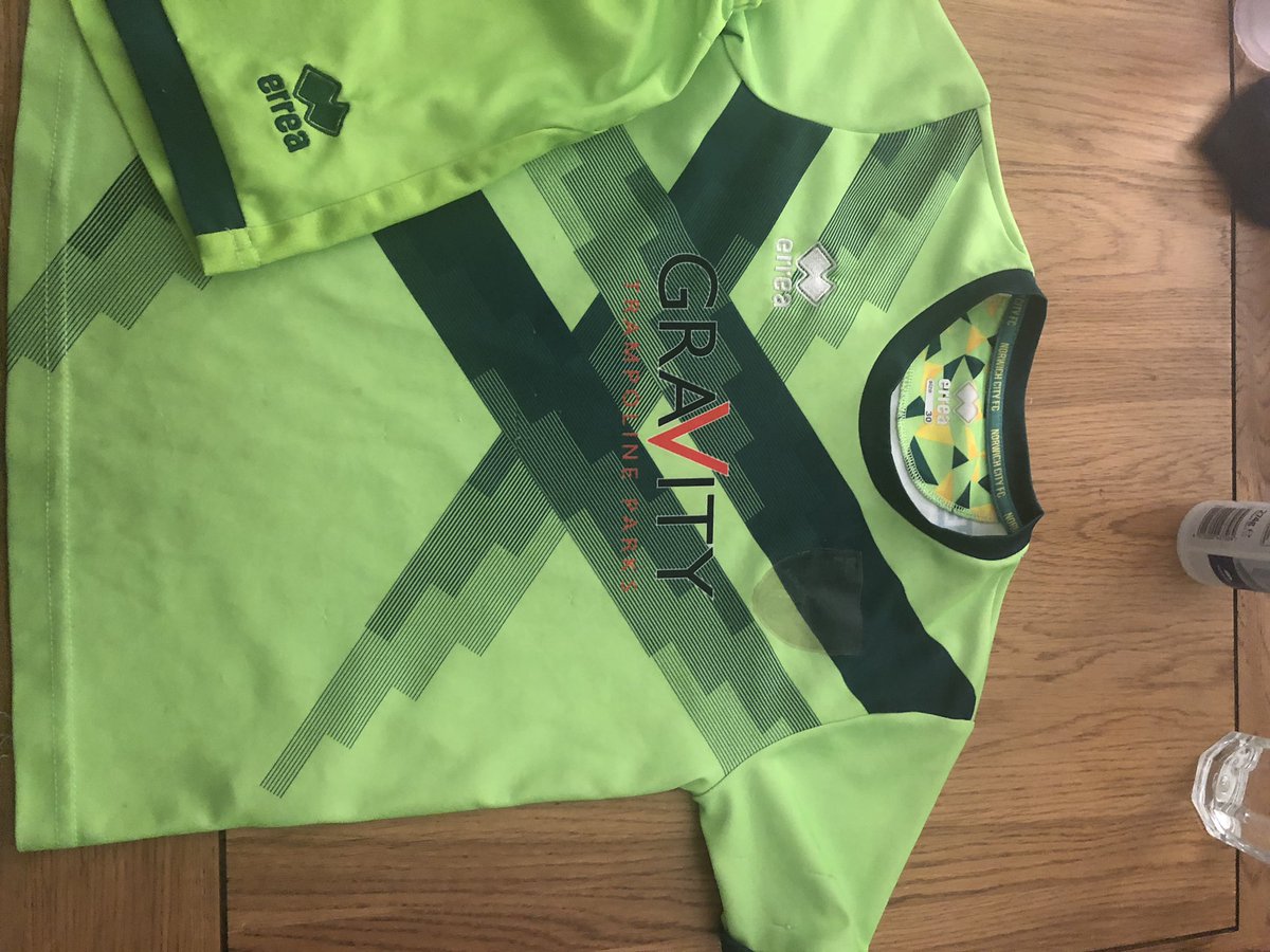 tomlin_amy's tweet photo. @NorwichCityFC I am fuming!! We bought our 5 yr old son this 3rd kit 1 month before the end of the season as he really wanted it.. it cost £65 and now the badges have come off both and is useless to us now! We buy him a new 1st kit with name at the start of each season! Appalling https://t.co/eXFKENbTAH