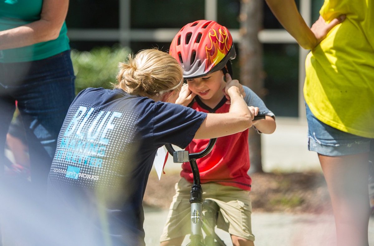 BlueCrossNC's tweet photo. It was such a joy to assemble 220 bikes for @USOofNC kids on our #Durham campus today. The annual event gives our employees a chance to honor military families and their service! 🇺🇸 #LifeAtBlueCrossNC 🚲 https://t.co/Zgzx2TFl9J