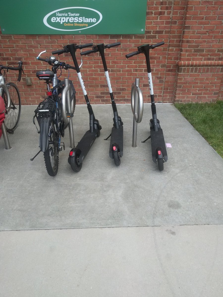 TobyBerla's tweet photo. @BirdScooters1 is this how you want to appear in the world... Blocking bike racks? At Harris Teeter on 9th Street in Durham, NC. https://t.co/9rtjgglCoX