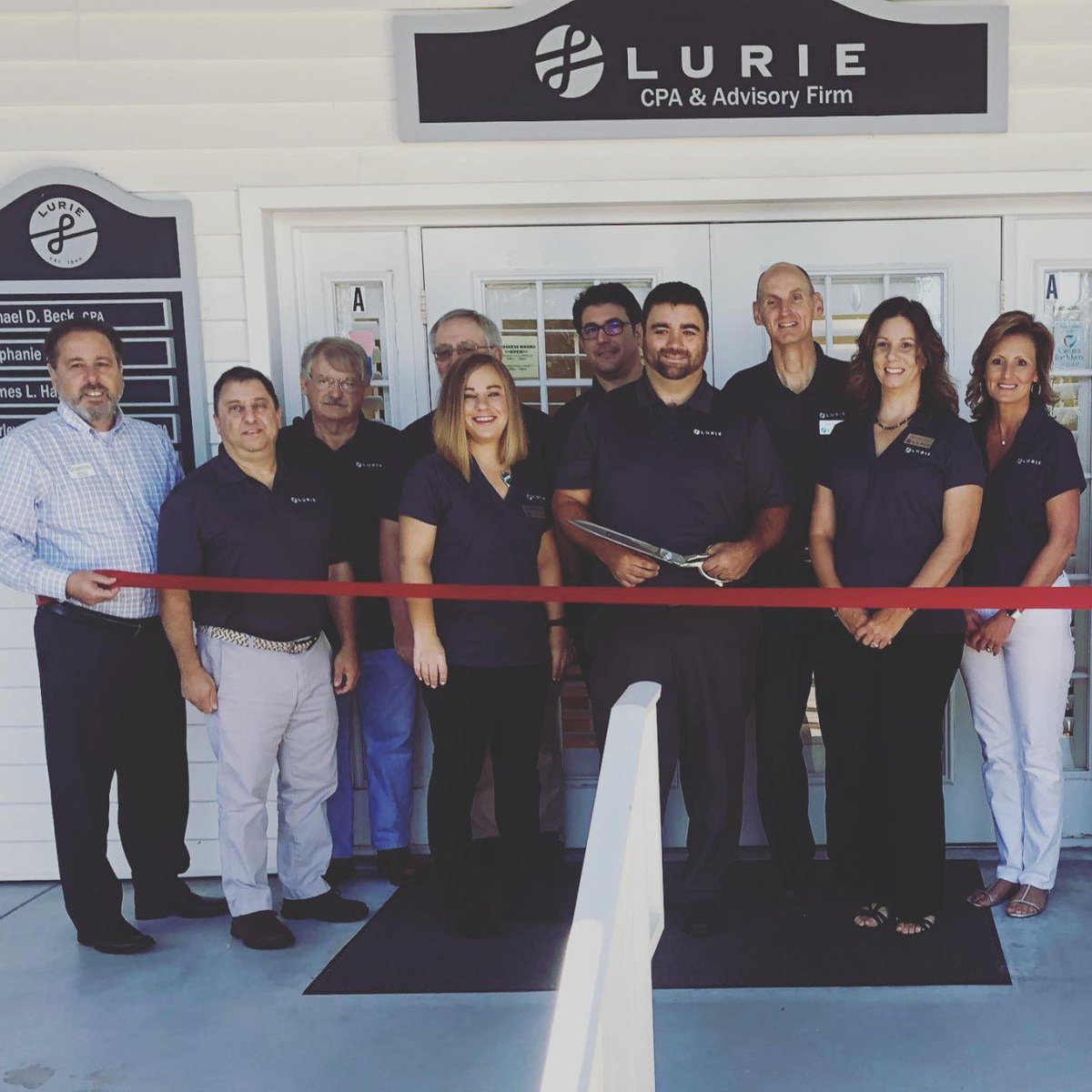 LurieLLP's tweet photo. This morning we celebrated our membership with the Greater Fort Myers Chamber of Commerce! Thank you for welcoming us as a member. #RibbonCutting #GFMCC https://t.co/cFJXieg7N8
