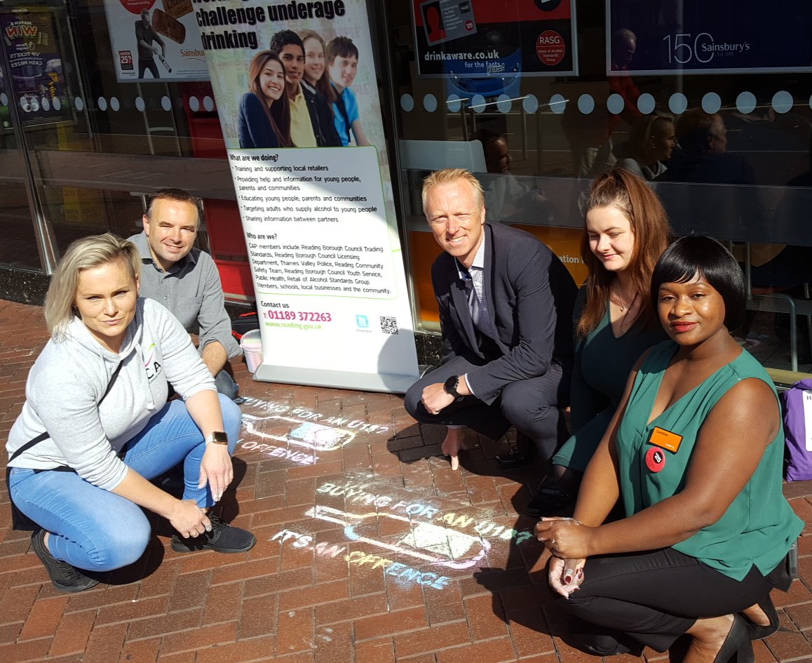 ReadingCouncil's tweet photo. Creative street art to remind people buying alcohol for under 18s is an offence. You could face a £90 fine if buying on behalf of a minor. Suspect an illegal purchase is taking place? Call the police on 101. @ReadingCAP @ReadingTSS @CApUKTweets @Sainsburys #rdguk #rdg #ProxySales https://t.co/Ck15teTfvZ