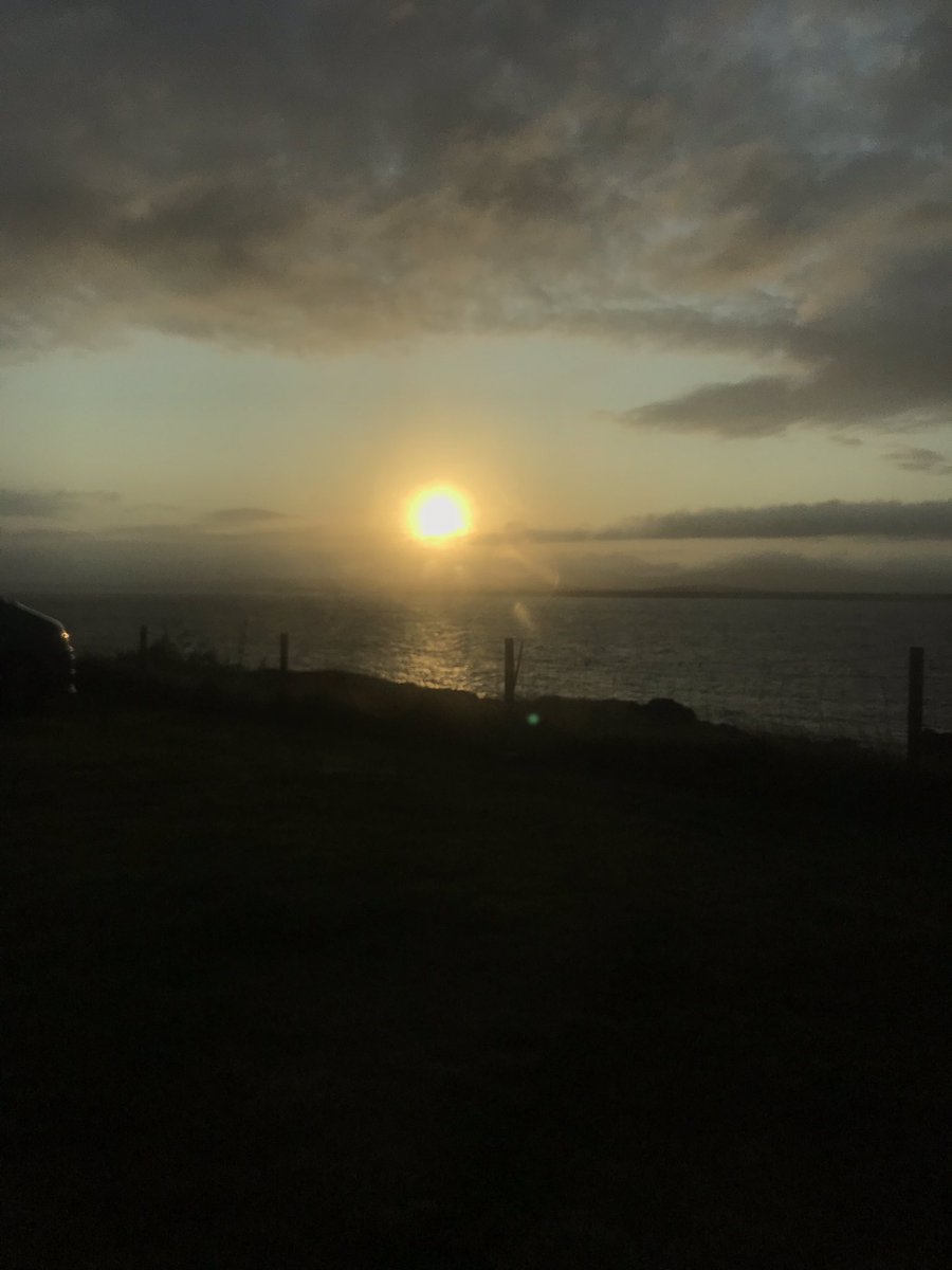 ItinerantPalaeo's tweet photo. Sunrise from the van earlier this morning. I’ll be sad to leave here. #Islay #BeforeWorkStarts https://t.co/Ya5sMU8qe9
