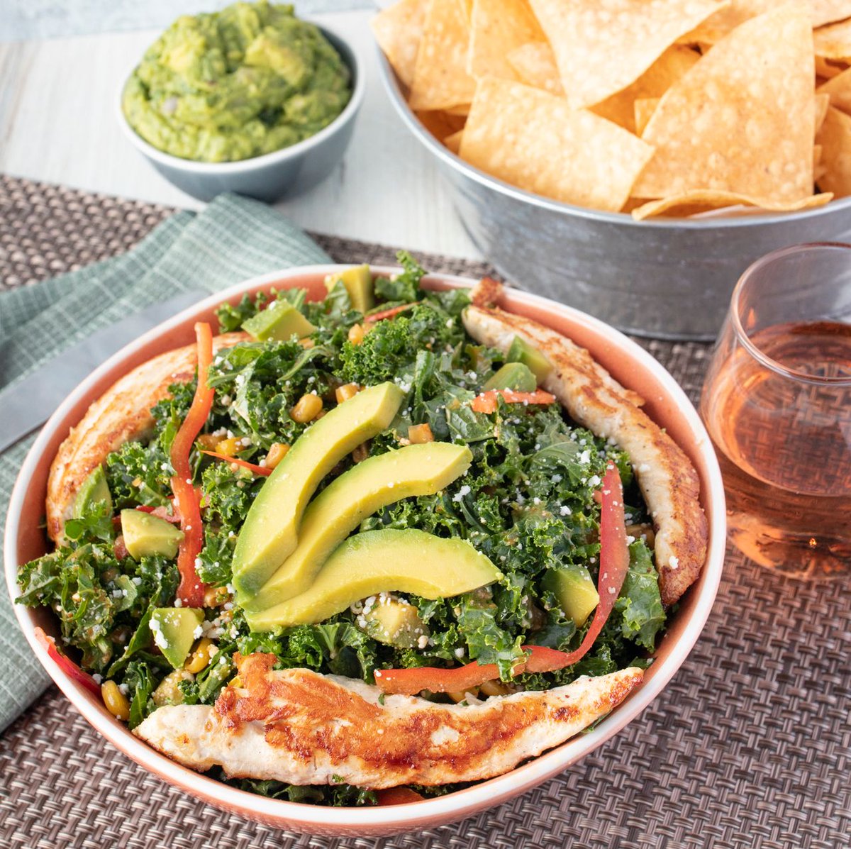 Dining at Tin Lizzy's doesn't have to mean an indulgence. We've added some fantastic salads to the lineup, all packed full of fresh nutrient-rich ingredients like kale, peppers, avocado, garbanzo beans, and more! Pictured here: The Chicken Kale Salad.