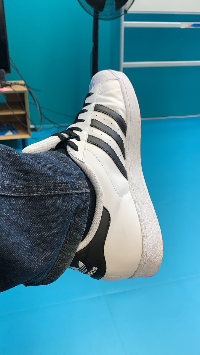 DeemziesTV's tweet photo. My new shoes are so white that they started building a wall to keep my other shoes out of the shoe closet. #freshshoes #superstar #adidas https://t.co/D8Emv4chmx