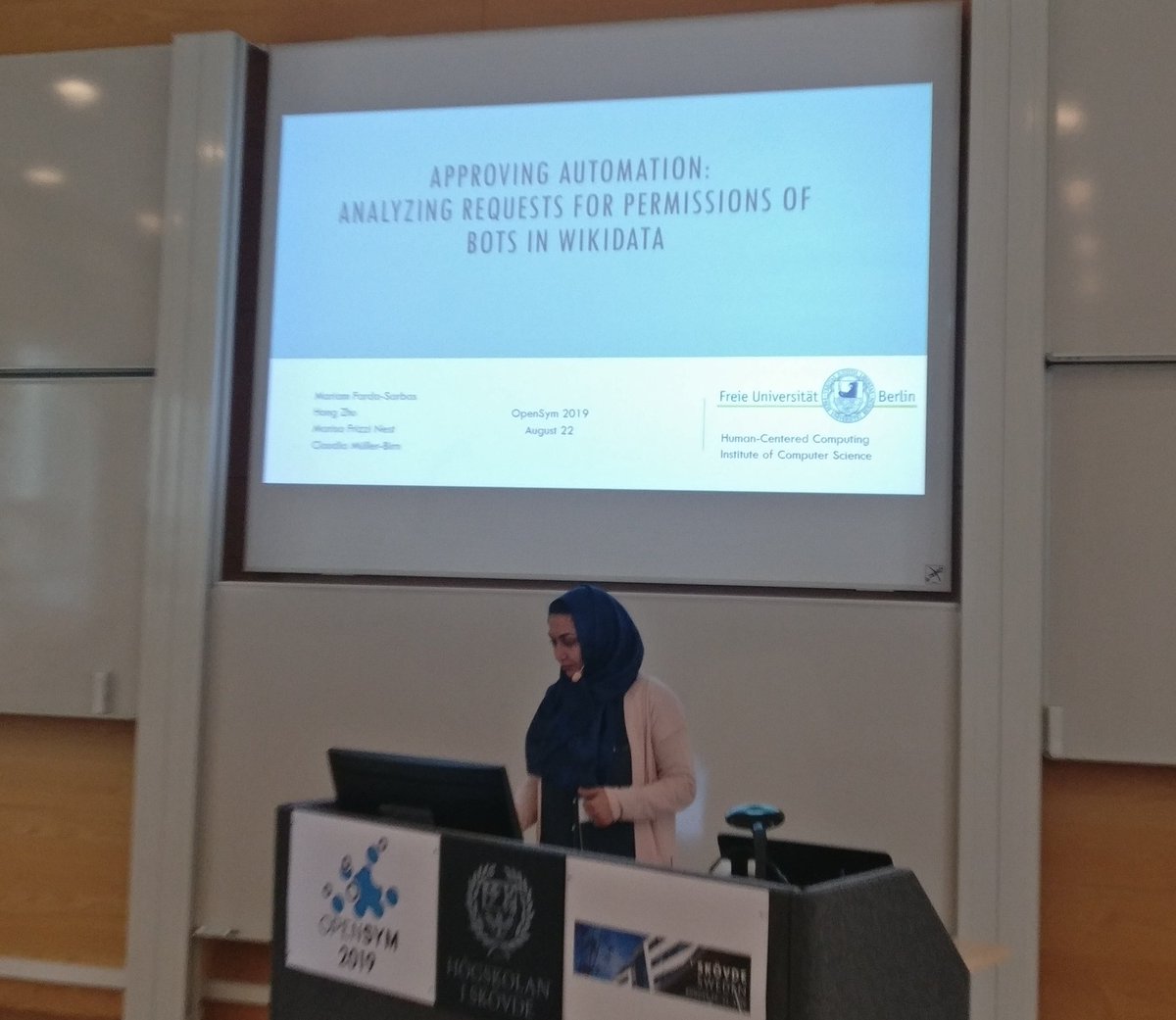 frimelle's tweet image. Mariam Farda-Sarbas presenting community&apos;s bot approval on @wikidata at #OpenSym. Most bots add/update data (completeness), very few add references, most use internal sources. If bots are not approved, usually the operator is not active enough.