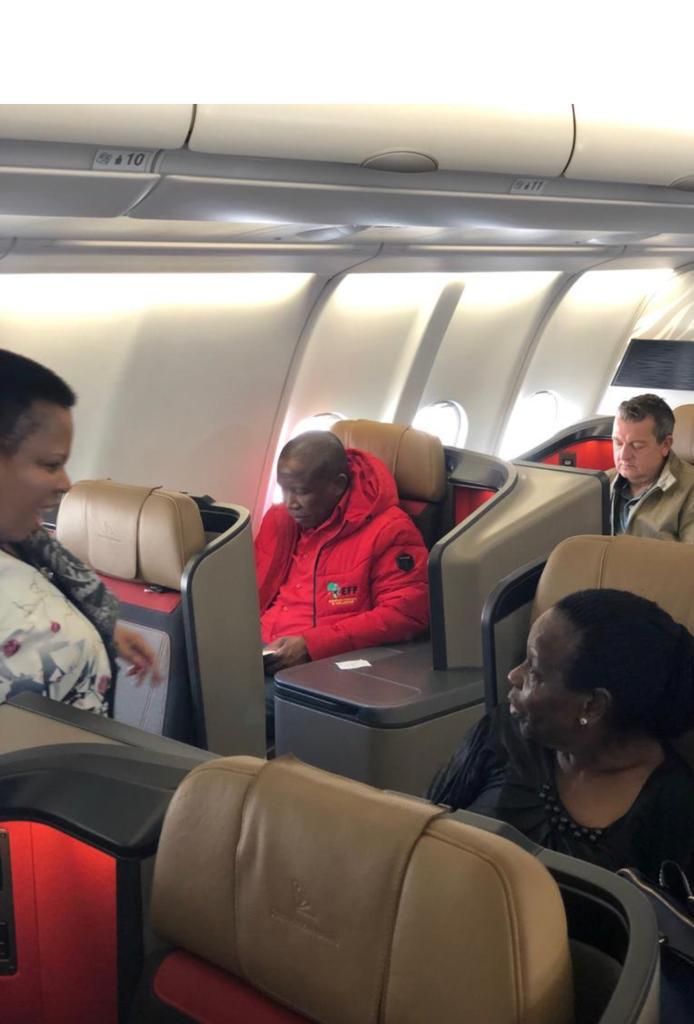 Enjoying some Moët et Chandon flying in business class while preparing to fight for the poor.