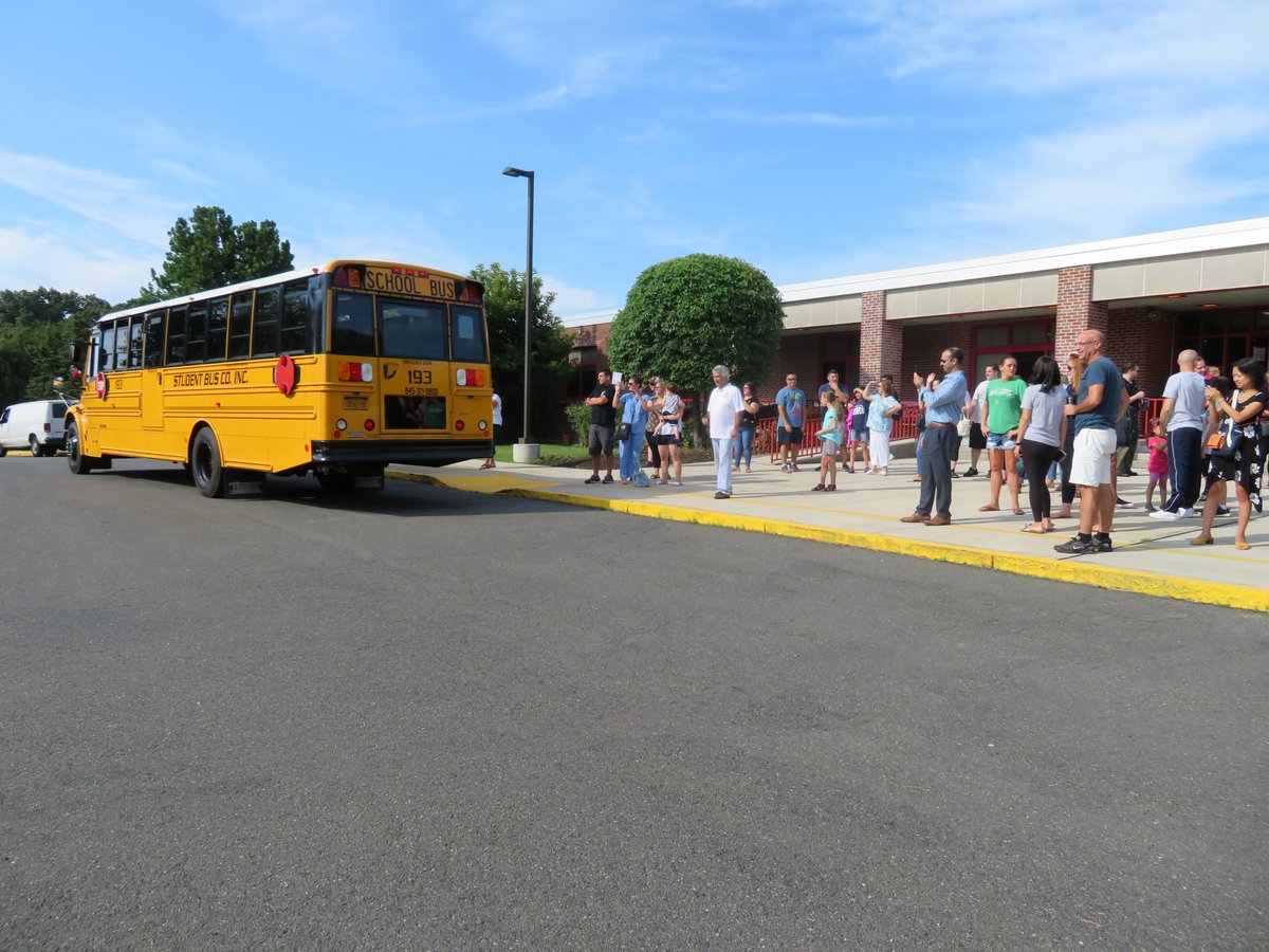 southorangetown's tweet photo. Kindergartners and their families met Principal @SheilaBeglin, Assistant Principal @mwhiteWOS and Supervisor of School Transportation Paul Guglielmo today at @WOSnews' Bus Orientation! They reviewed protocol for the upcoming year before taking a short bus ride up the block! https://t.co/rDYFMM41C1