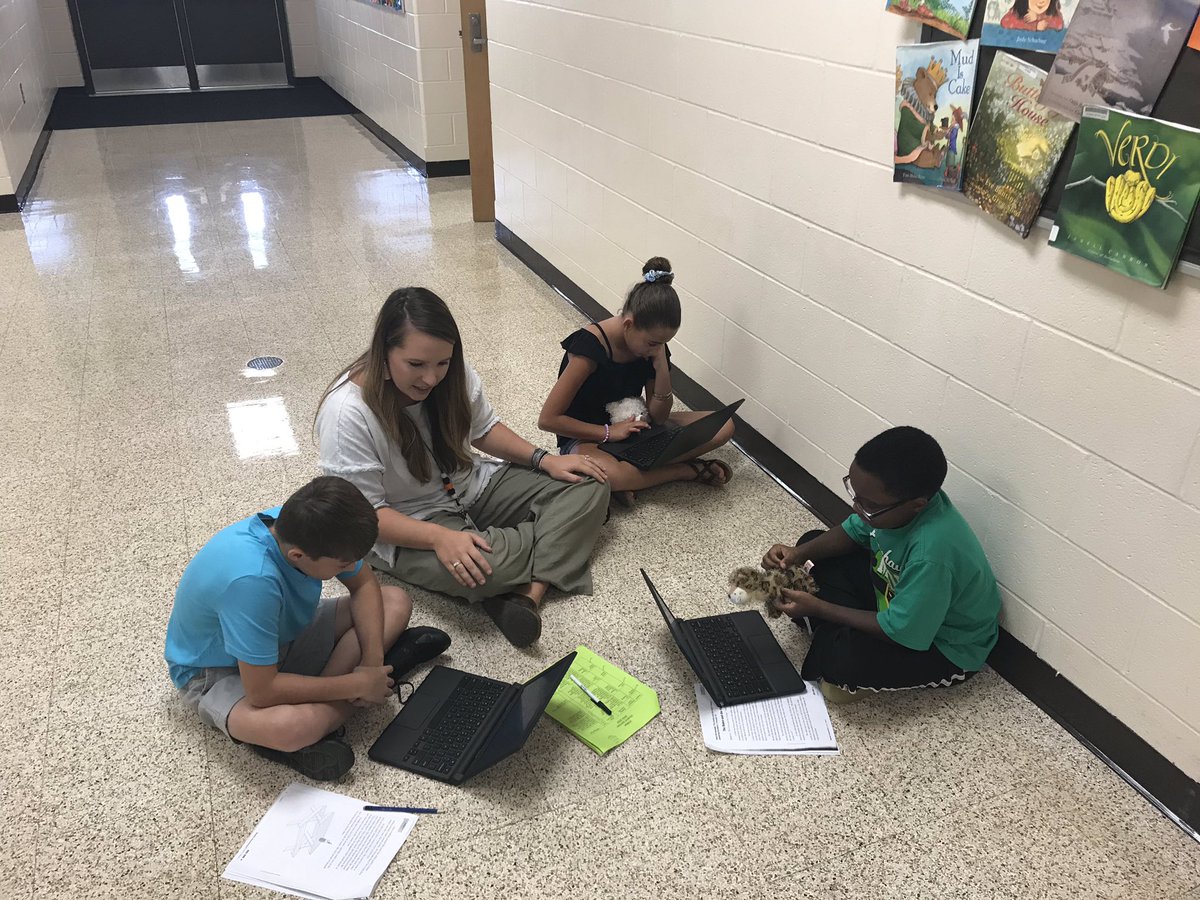 cobb1212's tweet photo. Mrs. Walker guiding our 4th graders with a reading assessment in the hallway. Learning takes place everywhere at AES. https://t.co/Dvp5iQ87sx